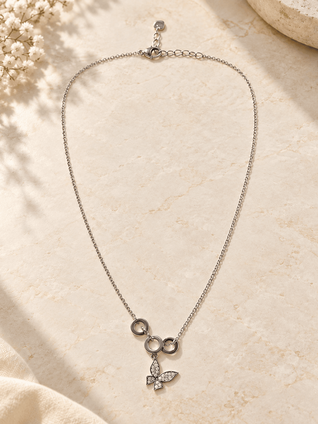 Silver Rings & Butterfly Necklace — hero